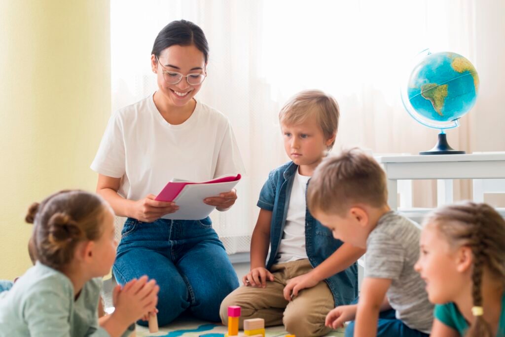kindergarten teacher holding notebook kindergarten teacher holding notebook